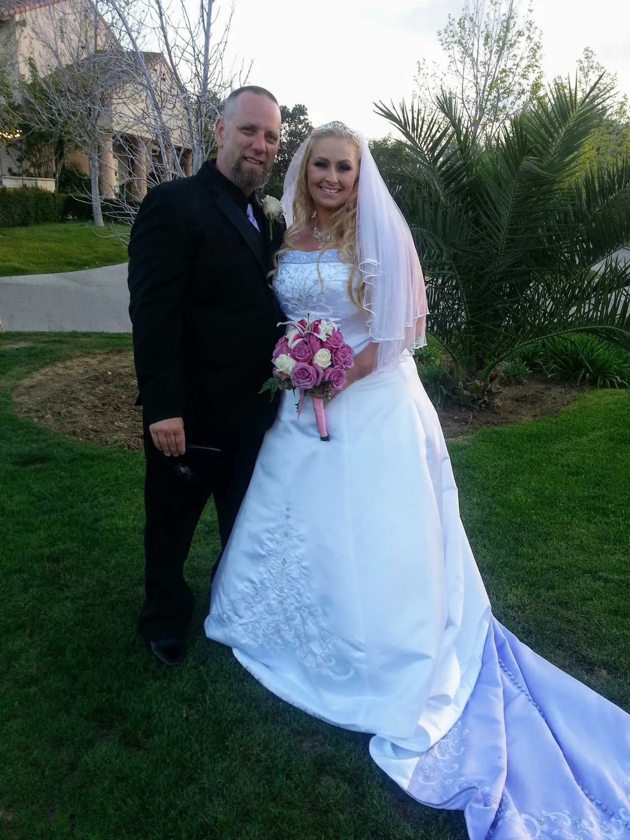 bride and groom smiling